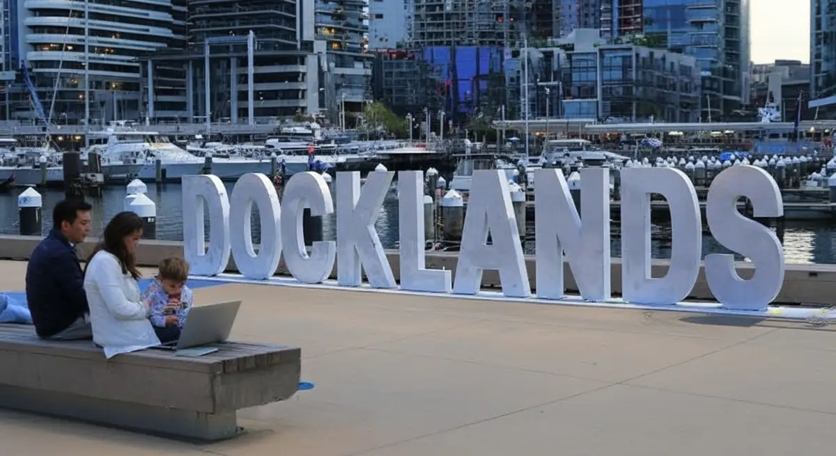People using free Wi-Fi along Docklands waterfront in Melbourne
